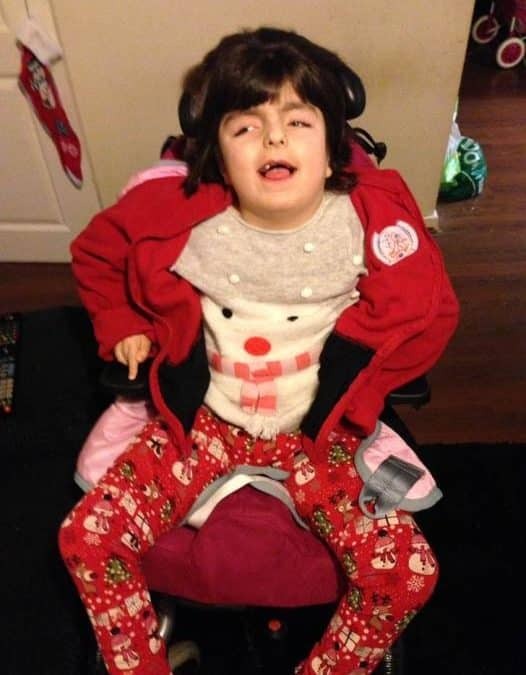 SIMPLE PIECE OF SPECIALIST EQUIPMENT MEANS EIGHT-YEAR-OLD CAN SIT WITH HER FAMILY AT LAST