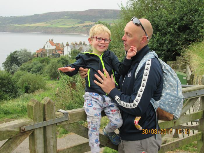PENSIONER OVERCOMES DISABILITY TO HELP LITTLE NOAH WALK